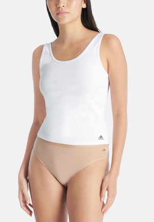 White ribbed tank top with a scoop neckline and Adidas logo on the hem, paired with beige high-waisted underwear. Smooth texture.