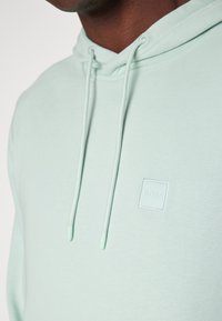 BOSS Bluză de molton - turquoise/aqua