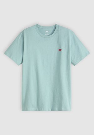 Light blue cotton T-shirt with short sleeves, crew neck, and a small red Levi's logo on the chest. Smooth texture, relaxed fit.