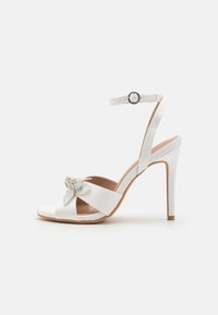 High heeled sandals - white