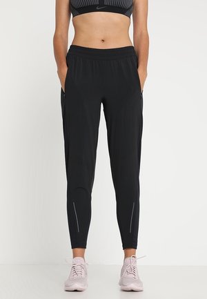Pantalones deportivos - black