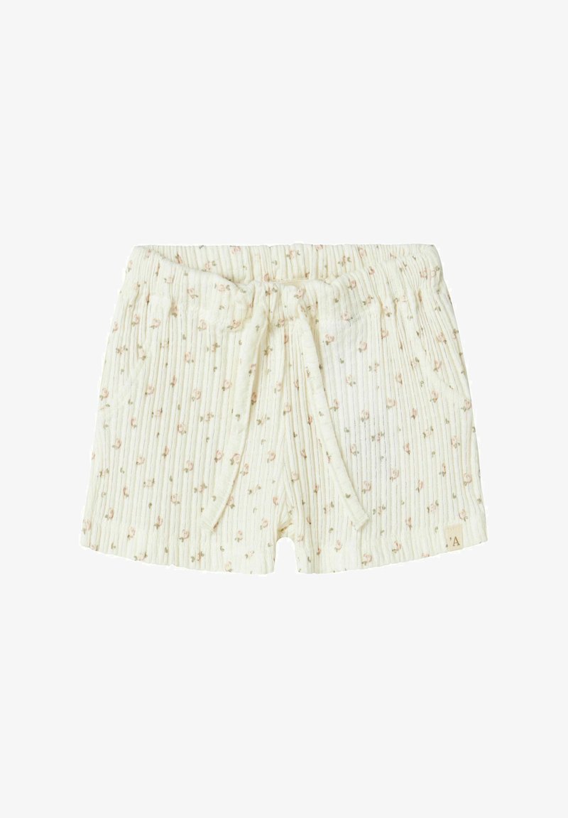 Svetlé krémové šortky s jemnou textúrou a kvetinovým vzorom v ružovej a zelenej farbe. Elastický pás so šnúrkou, bočné vrecká.