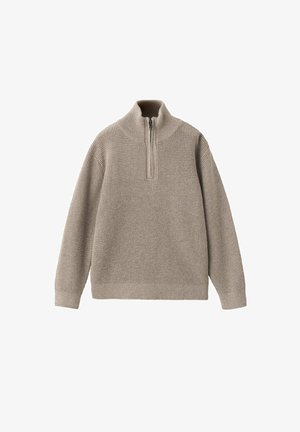 Pull en maille beige avec manches longues et col à zip partiel, tissu texturé, poignets et ourlet côtelés.