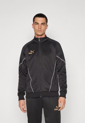 Puma KING ANTHEM JACKET - Veste de survêtement - black/matte gold-coloured/white