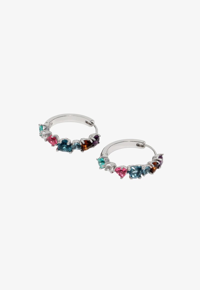 Silver hoop earrings with multicolored heart-shaped gemstones in teal, pink, blue, amber, and purple settings.