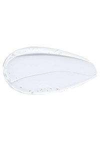 Una striscia di gel trasparente con piccole bolle d'aria su uno sfondo bianco, che mostra una superficie liscia e lucida.