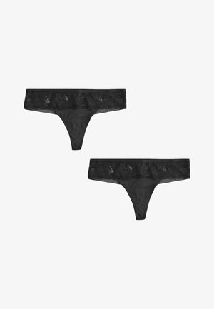 Fekete csipkés tangapapucs, amely széles csipkés derékrésszel rendelkezik virágmintával, áttetsző testkialakítással és minimalista dizájnnal.