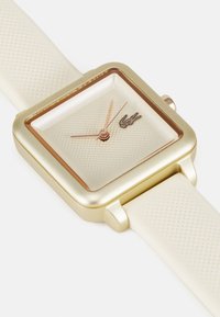 Lacoste FLOW - Karóra - champagne