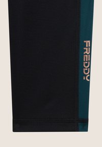 Freddy 7/8 IN  TECNICO CON VITA ALTA A INCROCIO - Leggings - black dark sea