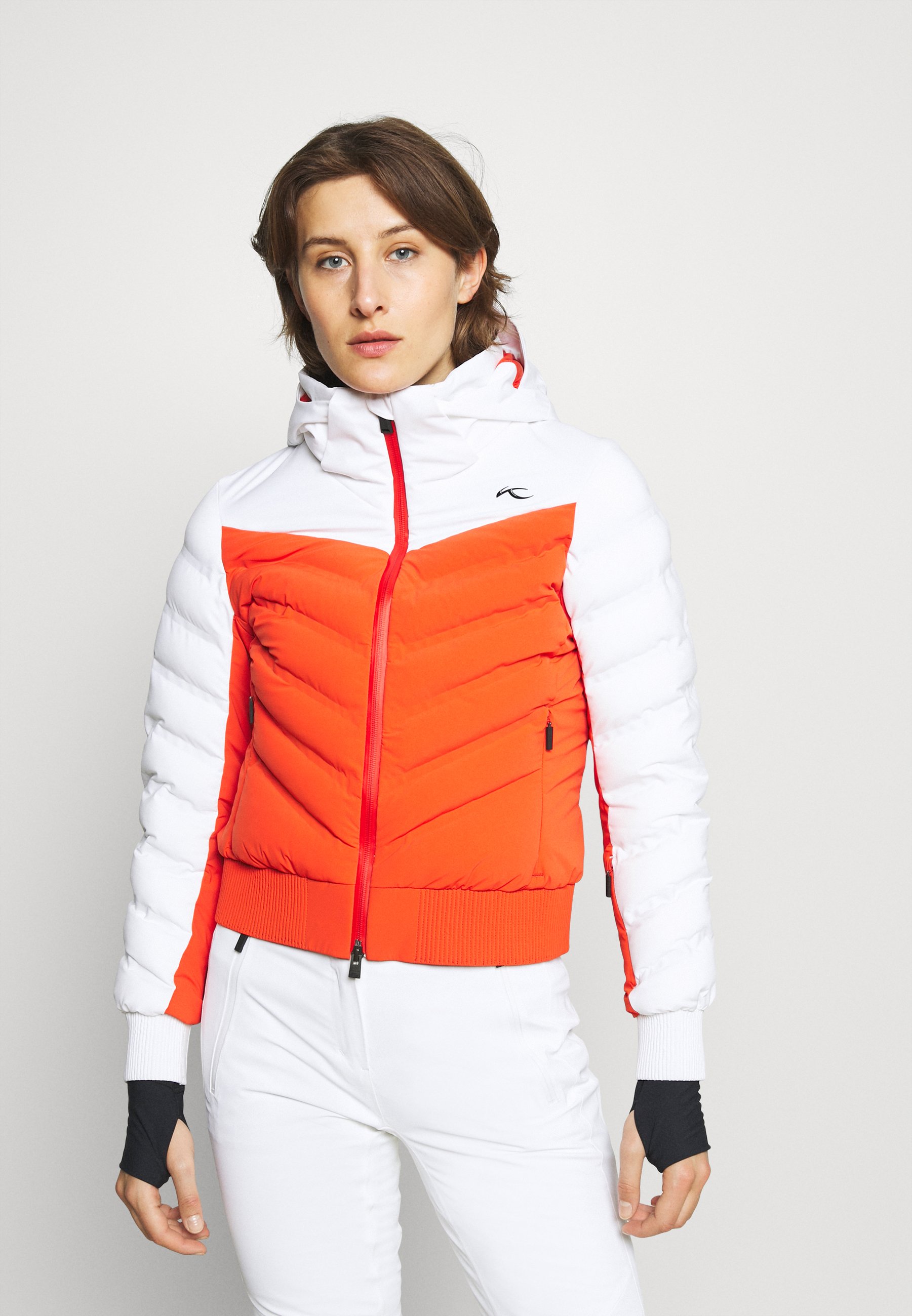 kjus orange ski jacket