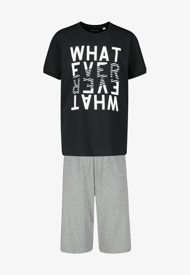 Black t-shirt with bold, reversed white text design, paired with light grey knee-length shorts made of soft fabric.
