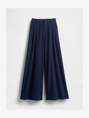 Navy blue wide-leg trousers made of textured fabric, featuring a high waistband, pleats, and a smooth finish with subtle pinstripes.