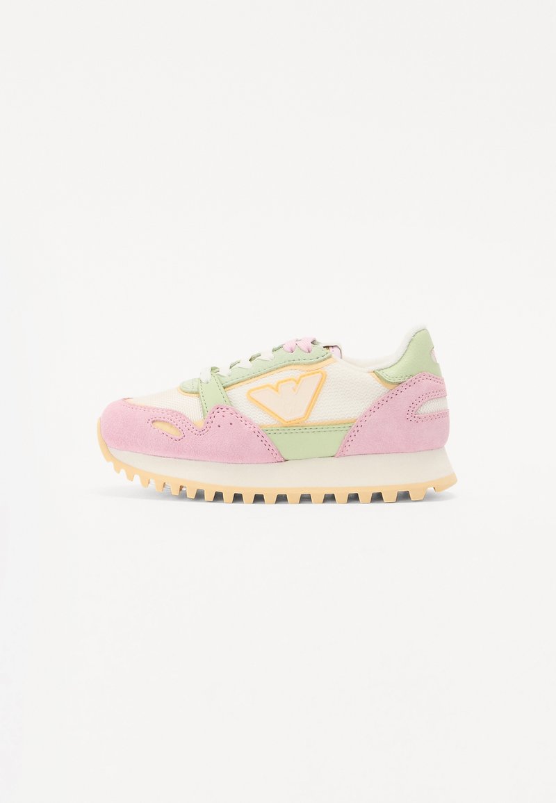 Multicolored sneaker featuring a pink suede toe, green accents, and a white textile upper. Designed with a textured rubber sole and lace closure.