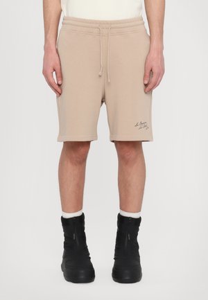 Tracksuit bottoms - neutral nude