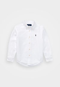 Camicia bianca a maniche lunghe con bottoni, realizzata in cotone. Presenta un colletto classico, orlo arrotondato, bottoni dorati e un piccolo logo blu navy sul petto.
