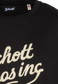 Zwarte katoen sweatshirt met een witte cursieve "Schott" logo. Rond de hals ontwerp met een zichtbare label dat maat L en Amerikaanse oorsprong aangeeft.