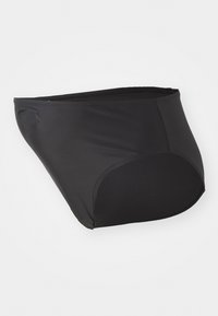 Caleçons de bain noirs en tissu lisse, avec une taille haute et des ouvertures pour les jambes incurvées, affichant une couture minimale et un design épuré.