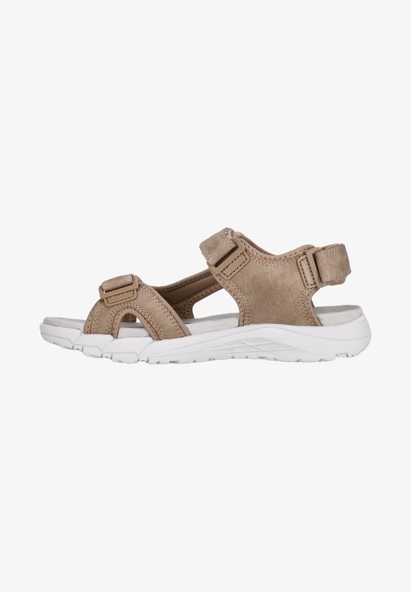 Lichtbruine suede sandalen met verstelbare banden en witte rubberen zolen. Voorzien van een gevoerd voetbed voor comfort. Open ontwerp met meerdere uitsparingen.