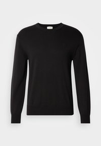 Pull noir à col rond en tissu tricoté doux. Il présente des manches longues et un logo discret sur la poitrine. Coupe classique et texture lisse.