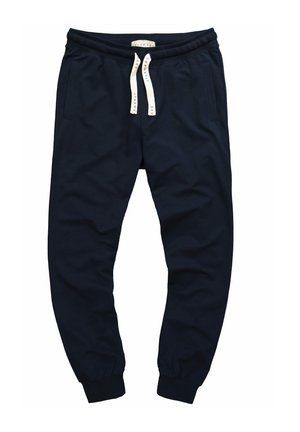 Pantalones jogger azul marino con cintura acanalada, cordón, bolsillos laterales y perneras ajustadas. Tejido suave con una textura lisa.