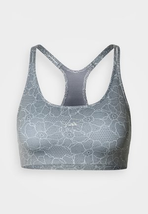 Brassière de sport gris clair avec un motif en dentelle florale. Présente un design dos nageur et un tissu doux et extensible pour le confort et l'ajustement.