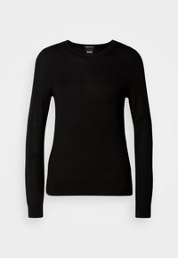 Pull noir à manches longues avec encolure ronde, silhouette ajustée et bas et manches subtilement côtelés.