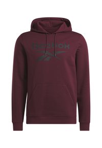 Sudadera con capucha color burdeos hecha de un tejido suave, que presenta un bolsillo frontal y un gran logo negro de Reebok en el pecho.