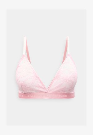 Bralette en dentelle rose avec un décolleté en V, doté d'une bande rose douce ornée du texte "TOMMY HILFIGER" et de motifs floraux délicats.