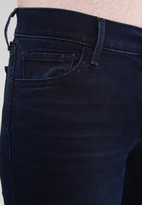 Levi's® Jeans Skinny Fit - blue-black denim