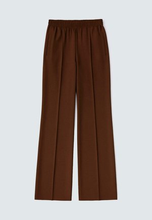 Brown wide-leg trousers featuring an elasticated waistband, two side pockets, and a smooth, textured fabric.