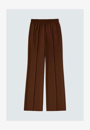 Brown wide-leg trousers featuring an elasticated waistband, two side pockets, and a smooth, textured fabric.