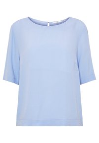 Blusa leggera azzurro chiaro a maniche corte con collo rotondo e chiusura a occhio di bue sul retro. Realizzata in un tessuto morbido con una vestibilità rilassata.