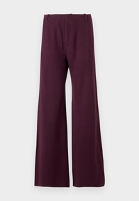 - Spodnie materiałowe