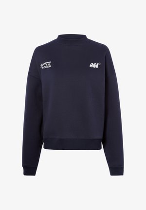 Marineblauwe crewneck sweatshirt met geribbelde manchetten en zoom, met witte tekst "Sweetheart of the Rodeo" en "ACL" op de borst.