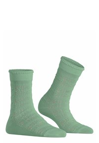 Hellgrüne Baumwoll-Socken für den Knöchel mit einem strukturierten Strickmuster, geripptem Bündchen sowie verstärkten Zehen und Fersen für Langlebigkeit.