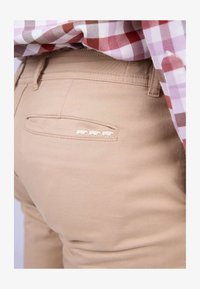 Sélectionné, beige