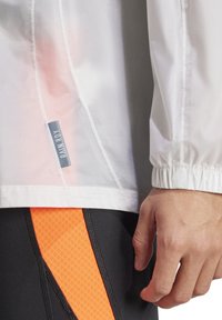 adidas Performance Regenjacke / wasserabweisende Jacke - weissschwarz