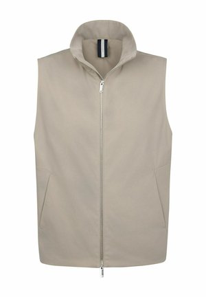 Chaleco sin mangas beige en tejido liso con cuello alto y cremallera frontal. Cuenta con dos bolsillos laterales. Diseño sencillo, sin patrones visibles.