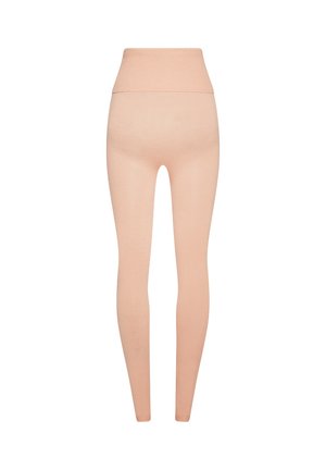 Hochtaillierte, hellbeige Strickleggings mit breitem geripptem Bund, flach auf einem weißen Hintergrund ausgestellt.