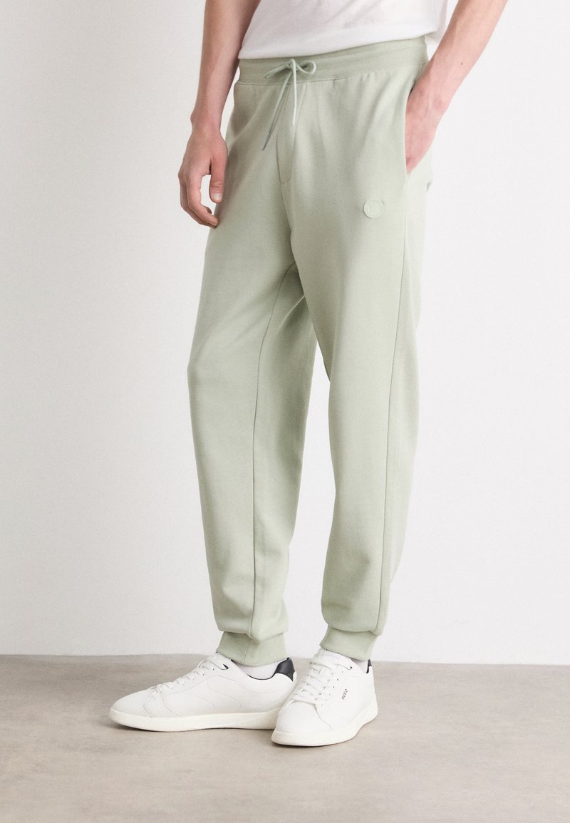 HUGO NOMPIO - Donji dijelovi trenirke - light/pastel green