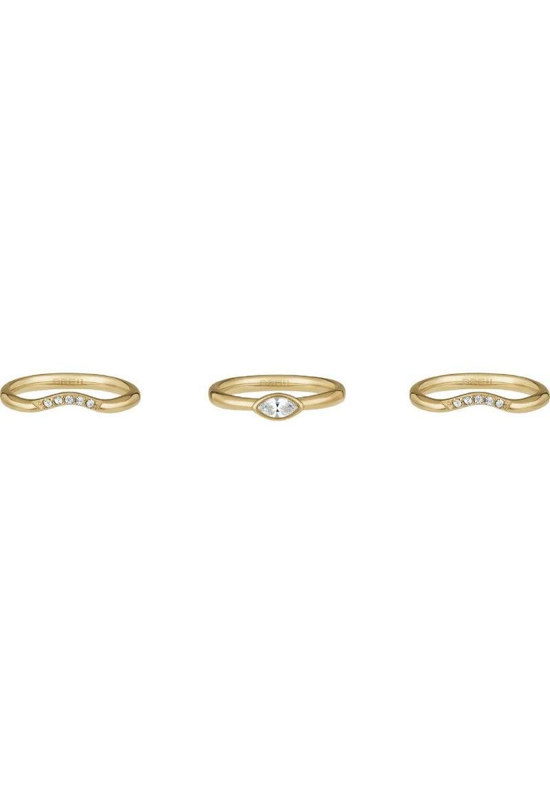 Set di tre anelli d'oro: uno con piccoli diamanti, uno con una pietra centrale a forma di marquise e uno con un design ondulato decorato con diamanti.