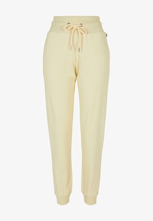Pantalons de survêtement jaune clair avec une taille côtelée, fermeture à cordon, poignets élastiques et poches latérales. Tissu doux avec une texture lisse.