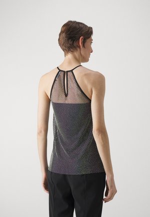 Sorte mesh top med multicolor prikkemønster, halterneck-design og nøkkelhullsdetalj bak, med en myk, lett tekstur.