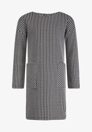 Schwarz-weiß kariertes langärmeliges Kleid mit zwei aufgesetzten Taschen vorne und rundem Ausschnitt.