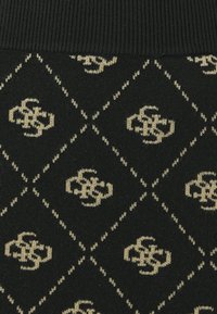 Tessuto in maglia nera con un motivo a diamante beige e loghi geometrici ripetuti. Banda superiore a coste testurizzate.
