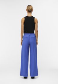 Object OBJLISA WIDE NOOS - Trousers - amparo blue