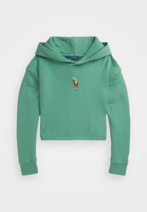 Haut à capuche coupe cropped vert en tissu doux, doté d'une poche kangourou à l'avant et d'un logo de joueur de polo brodé sur la poitrine.