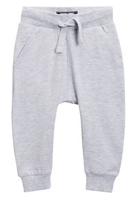 Helle graue Jogginghose aus weichem, strukturiertem Stoff, mit einem Kordelzugbund, zwei Seitentaschen und eng anliegenden Bündchen.