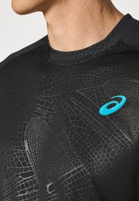 ASICS MATCH CAPSULE TOP - Sport T-Shirt - performance black