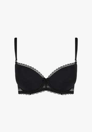 Czarny biustonosz wypełniony poduszkami, z koronkowym wykończeniem na górnej krawędzi, ozdobną kokardką na środku oraz regulowanymi ramiączkami. Gładki materiał i usztywniane miseczki.